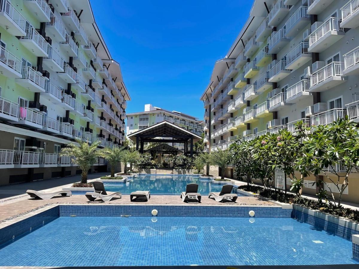 A minimalist and spacious 1Br condo at Amani Grand Resort Residences Mactan near MCIA - B&B Pusok