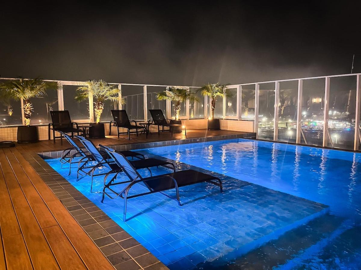 Piscina aquecida e ar condicionado no centro - Chambres d'hôtes Bertioga