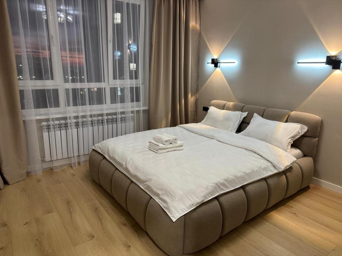 Светлые апартаменты в центре с видом на город - B&B Almaty