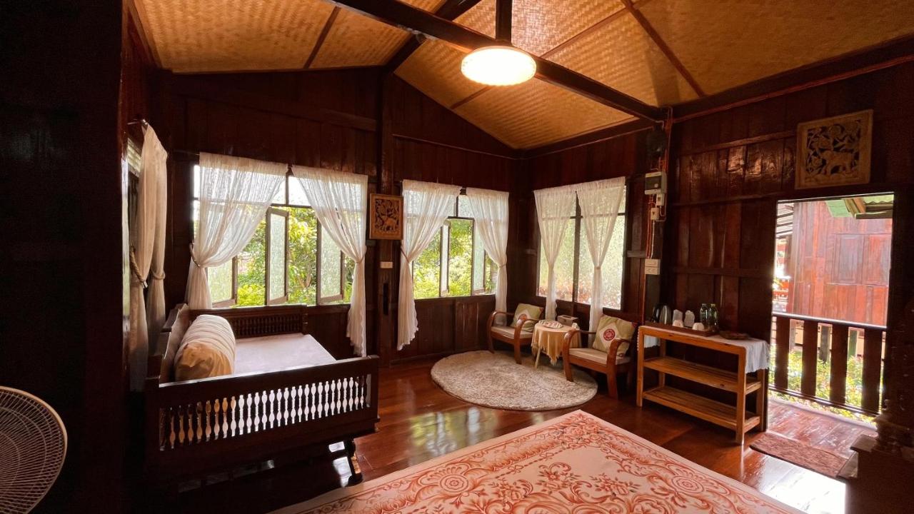 Habitación doble deluxe con cama grande y vistas al jardín