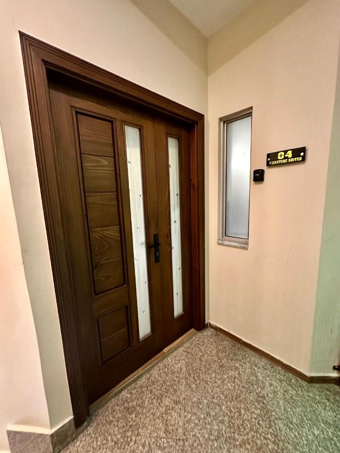 Signature Apartments - Ferienwohnung Faisalabad