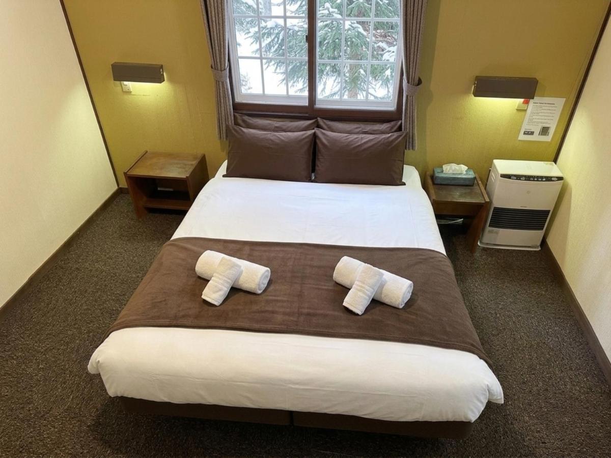Chambre Familiale avec Salle de Bains Commune