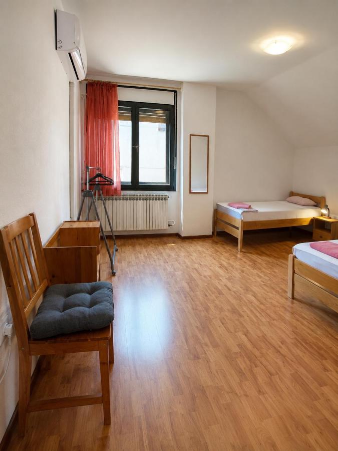Tweepersoonskamer met 2 Aparte Bedden