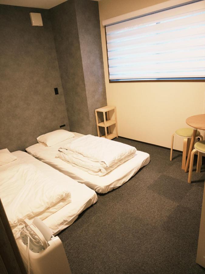 Chambre Lits Jumeaux Standard avec Salle de Bains Commune