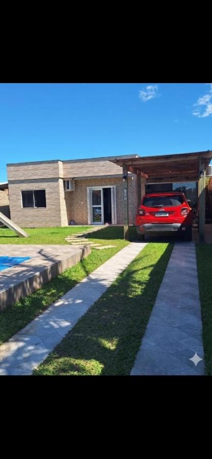 Casa com piscina em Torres - Ferienwohnung Torres