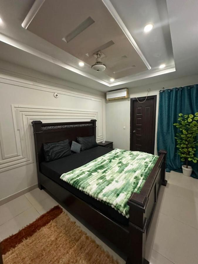 Nestay Comfy 2 Bhk-Cozy Style & Comfort - Chambres d'hôtes Islamabad