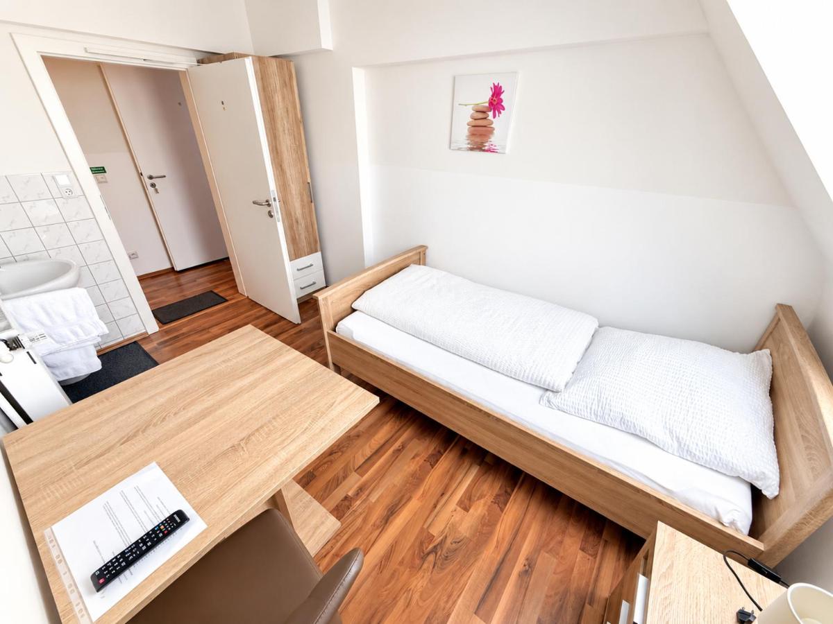 Camera Singola con Bagno in Comune
