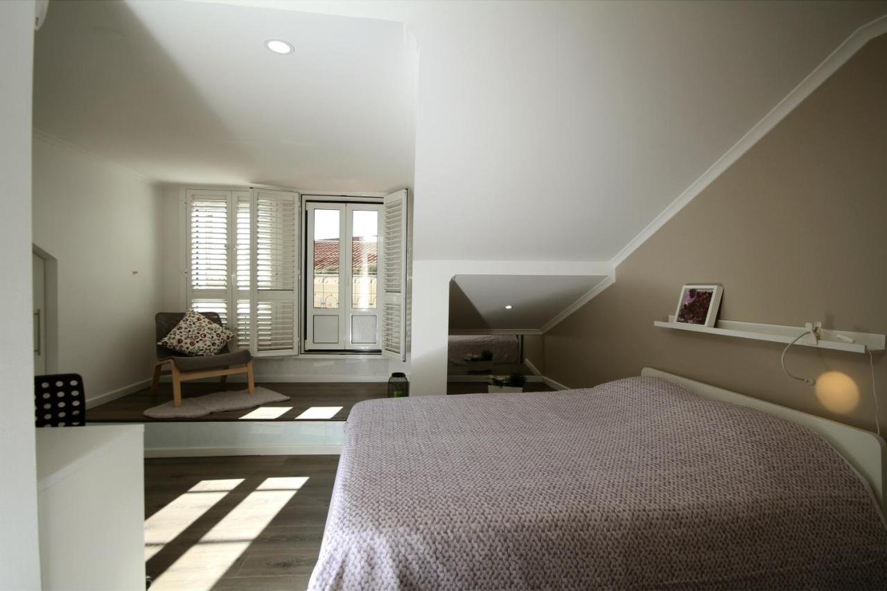 Appartamento con Balcone e Vista Fiume