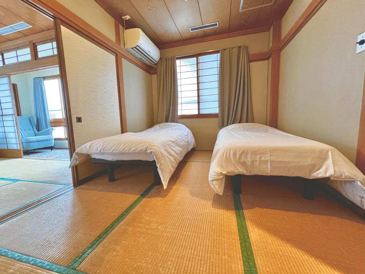 Hakuba Landmark Happo Lodge - B&B Hakuba