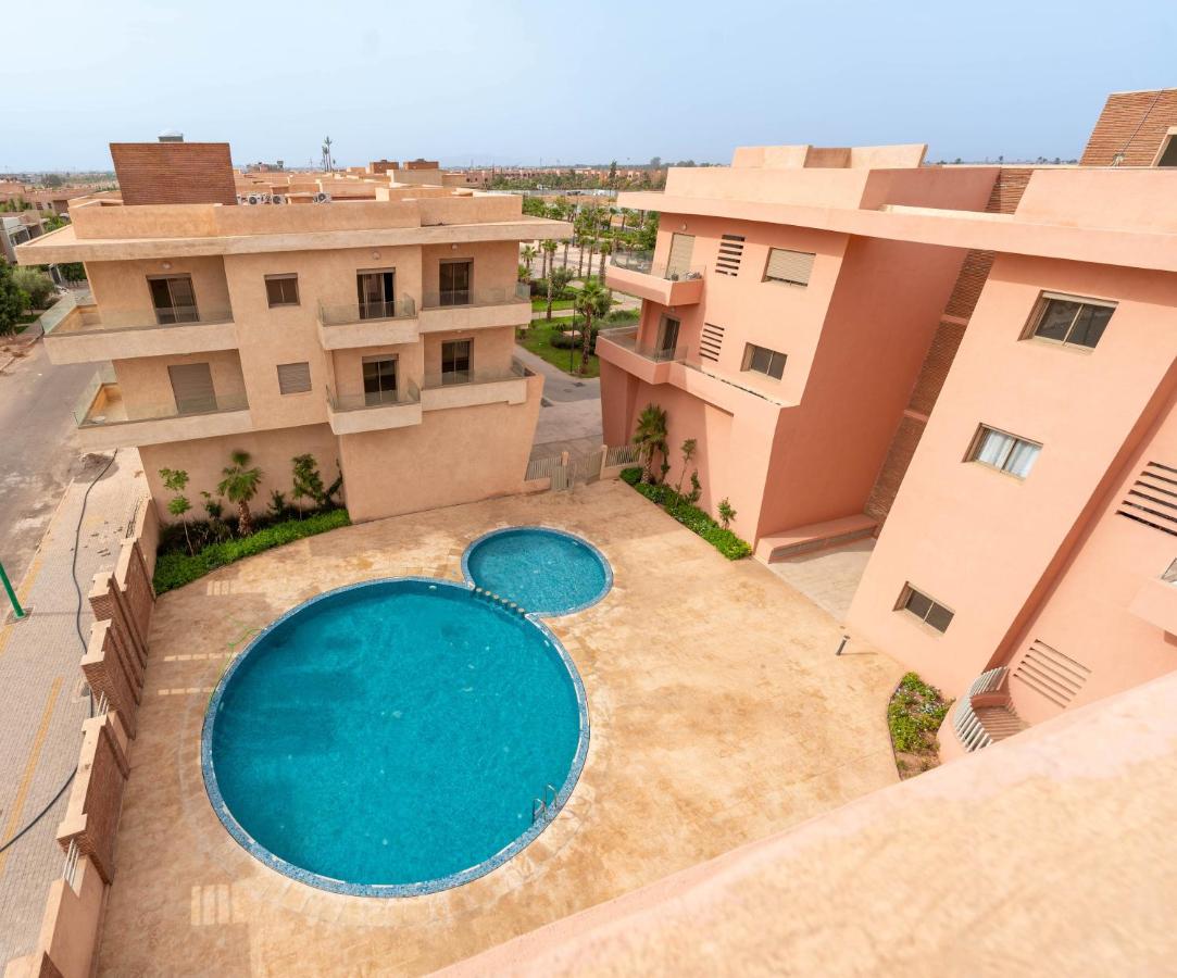 Modernes Apartment mit Poolblick & Balkon - B&B Marrakech