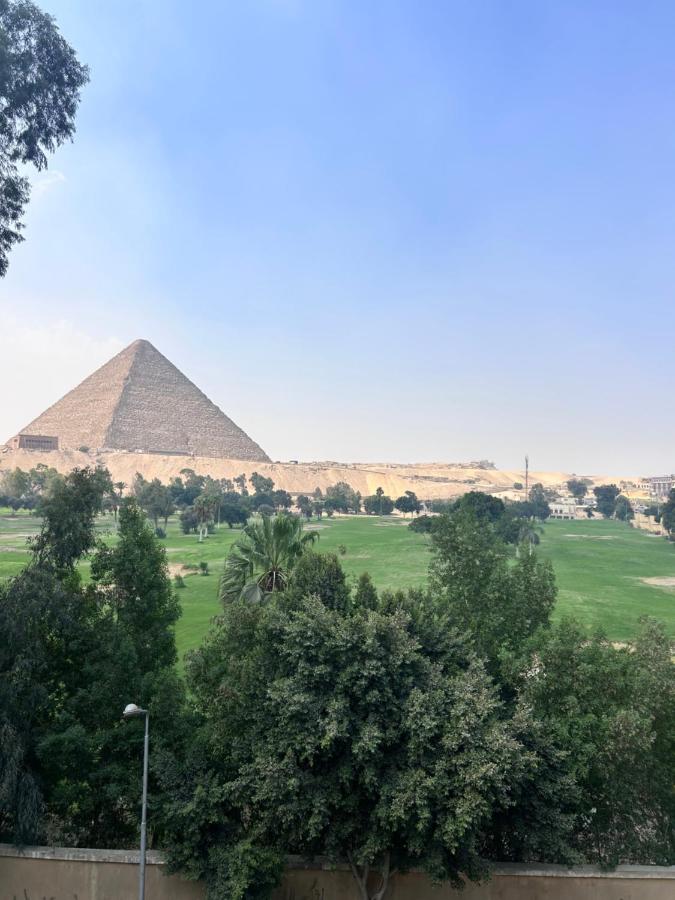 Pyramids Golf View Apartment - Chambres d'hôtes Le Caire