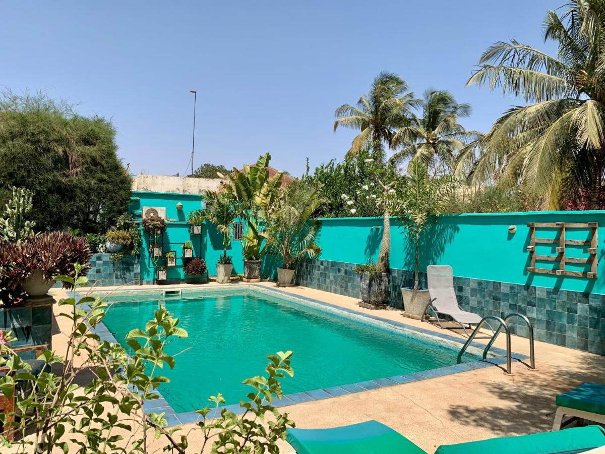 Au Petit Paradis - chambre climatisée et piscine - B&B Sali Niakhniakhal