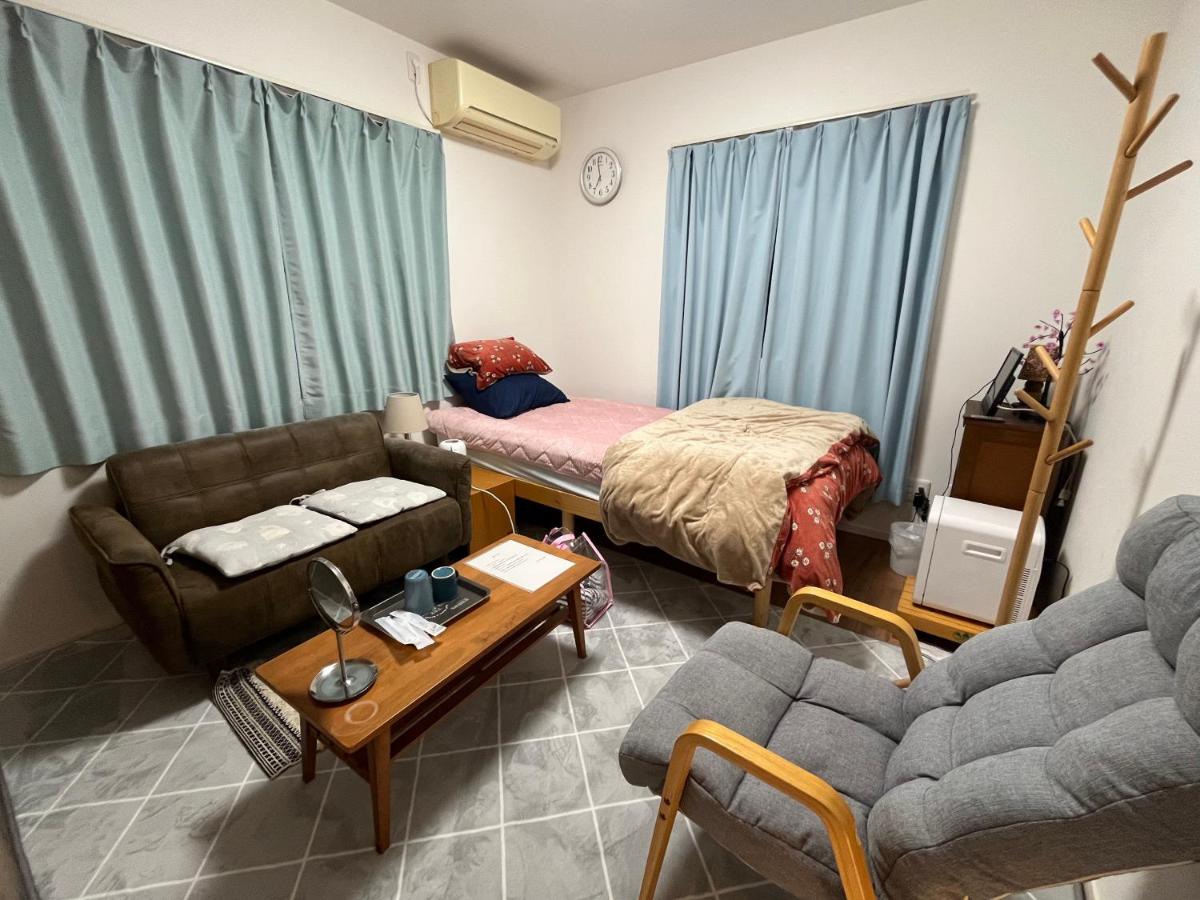 Single Room with Shared Shower and Toilet
