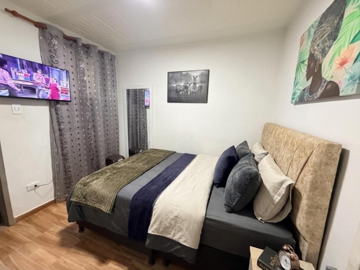 Apartamento amoblado cerca al aeropuerto el dorado - Chambres d'hôtes Bogota