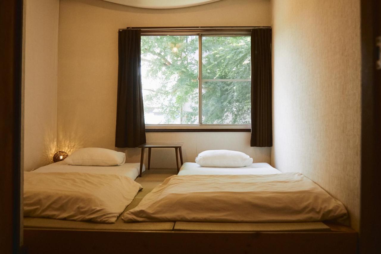 Tweepersoonskamer in Japanse Stijl met 2 Aparte Bedden
