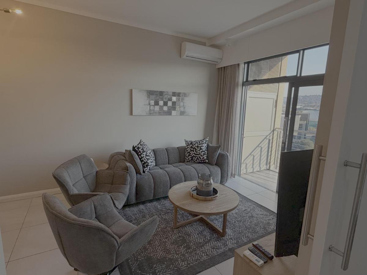One-Bedroom Apartment with Balcony and City View