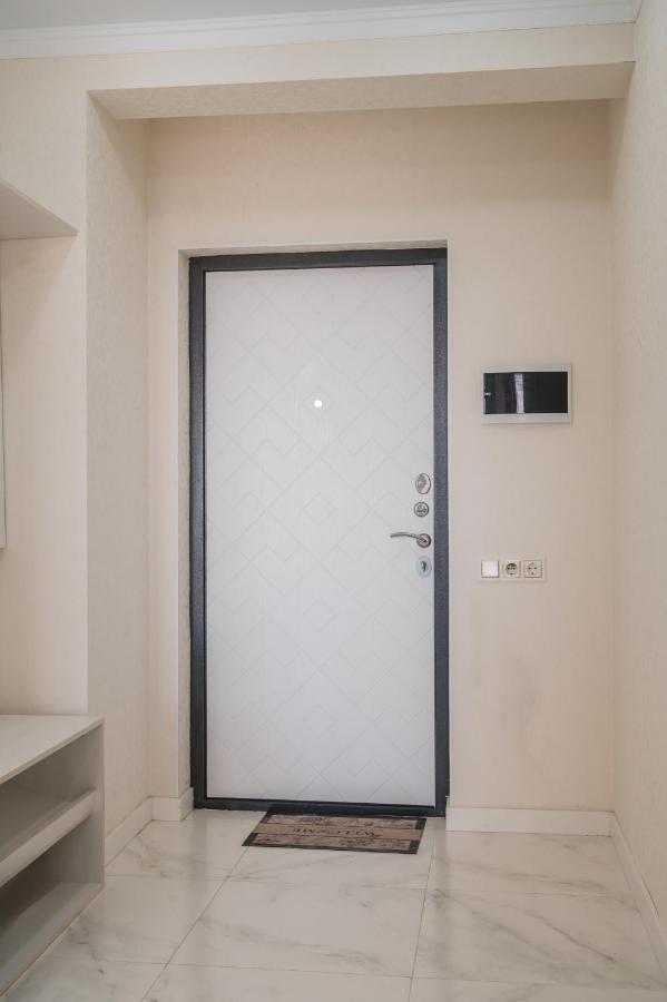 Сан Сити ЖК - Chambres d'hôtes Konayev