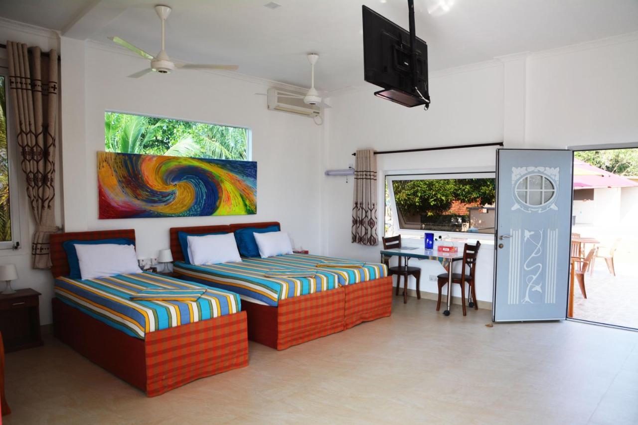 Habitación Triple con balcón