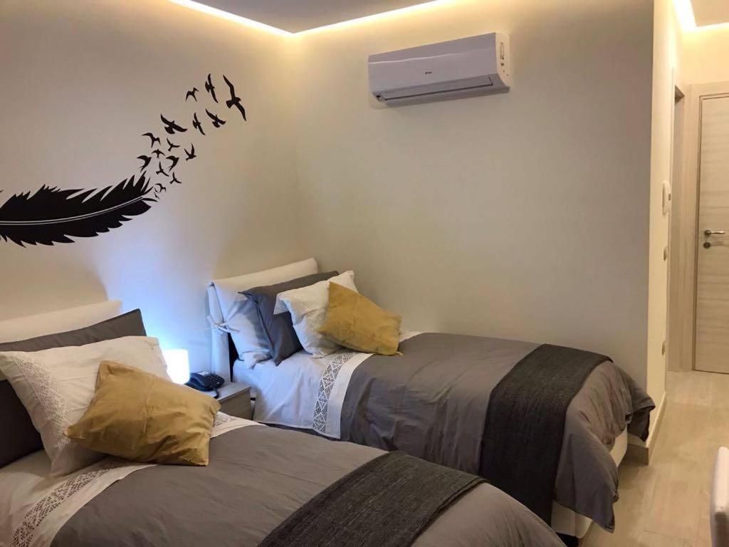 Camera Matrimoniale/Doppia con Letti Singoli