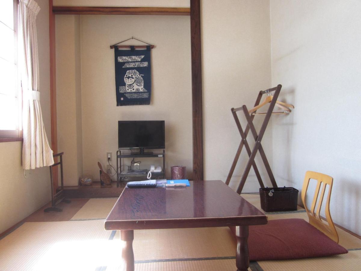 Single Room with Shared Toilet