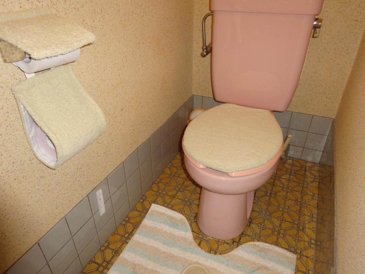 Camera Tripla Giapponese con Bagno in Comune