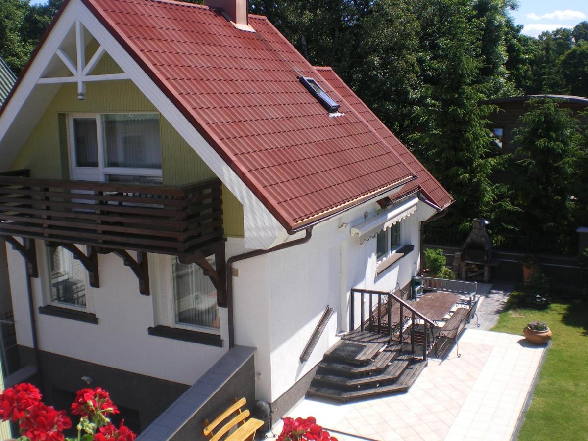 Zidinio Liepsnele - B&B Palanga