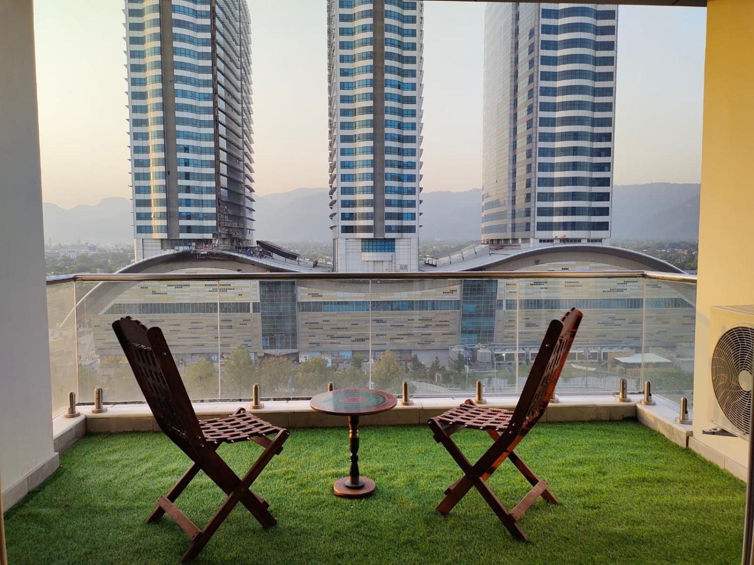 Balcony/terrace 3, Capital Elysium Retreat Luxurious Apartments facing Margalla & Centaurus Mall Islamabad View By Skyl, Islamabad