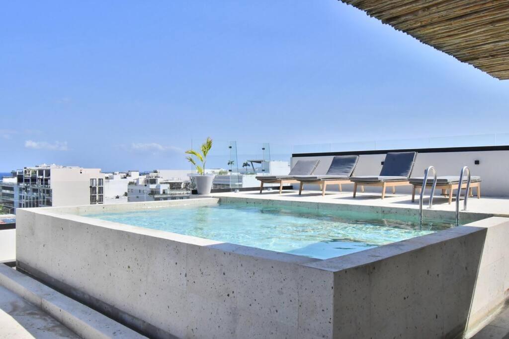 Swimming pool 4, Kumaru Suites by The Spot Rentals, Cozumel