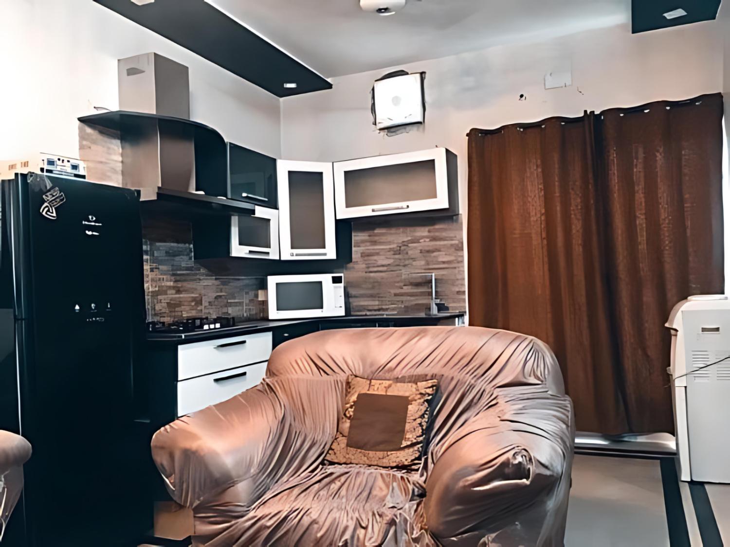 Shared lounge/TV area, Shah Guest House, Lahore