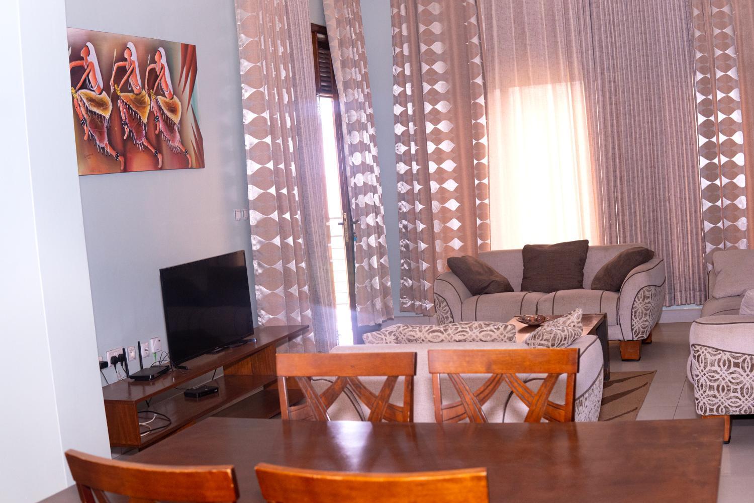 Shared lounge/TV area, Golf view suites Rwanda, Gasabo