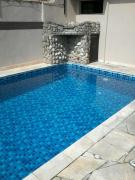 Casa familiar com Piscina Praia Grande