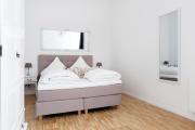 SC 04 by ROCKCHAIR Apartments l SUPERHOST Status l 4 Bedrooms Boxspringbeds 2 Bathrooms Balcony Elevator - Cozy Family & Business Flair welcomes you!