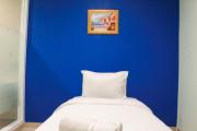 Simple Studio Room at Guest House Way Seputih near Central Park By Travelio