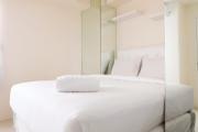 Comfort 2BR at Bassura City Cipinang Apartment By Travelio