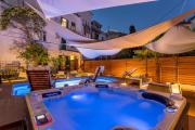 Evala luxury rooms with pool and garden