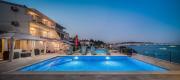 Gem of the sea luxury beach apartment with brand new heating infinity pool