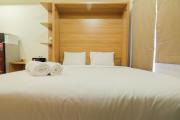 Modern Studio Apartment at 26th Floor Green Pramuka City By Travelio