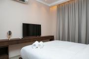 Minimalist and Cozy 2BR Citralake Suites Apartment By Travelio