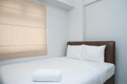 Tranquil Green Pramuka 2BR Apartment near Shopping Center By Travelio