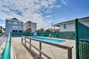 Condo with Balcony and Pool Walk to 2 Beach Accesses!