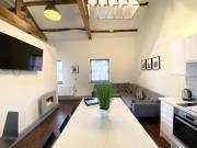 Loft at The Coach House Apartments Loft at The Coach House Apartments
