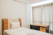 Comfy and Minimalist Studio Apartment Scientia Residence Tower B By Travelio