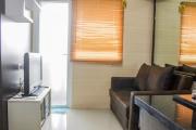 Minimalist 2BR Green Pramuka City Apartment near Shopping Mall By Travelio