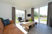Welcome in - Chalets vakantiepark Hart van Zeeland met zonnig terras