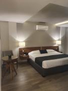 Estanza Hotel & Suites