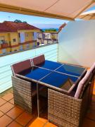 Apartamento con piscina y terraza al lado de la playa