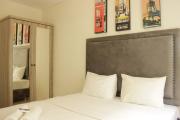 Simply Homey 1BR Apartment at Parahyangan Residence near UNPAR By Travelio
