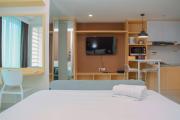 Grand Kamala Lagoon Studio Apartment with Modern Interior By Travelio