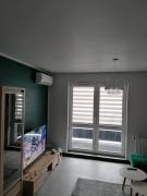 Apartament KUBIKS SADY Apartament KUBIKS SADY