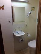 Small room with a private external bathroom